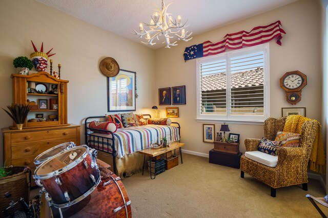 bedroom featuring light carpet and a notable chandelier