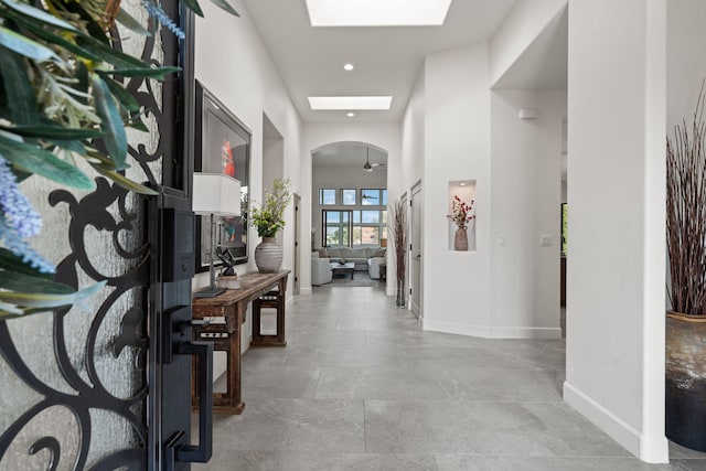 corridor featuring a skylight