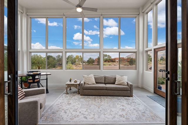 sunroom / solarium with ceiling fan