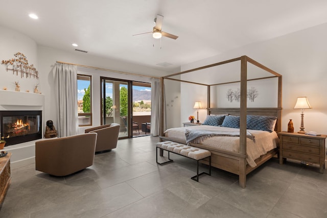 bedroom featuring ceiling fan and access to outside