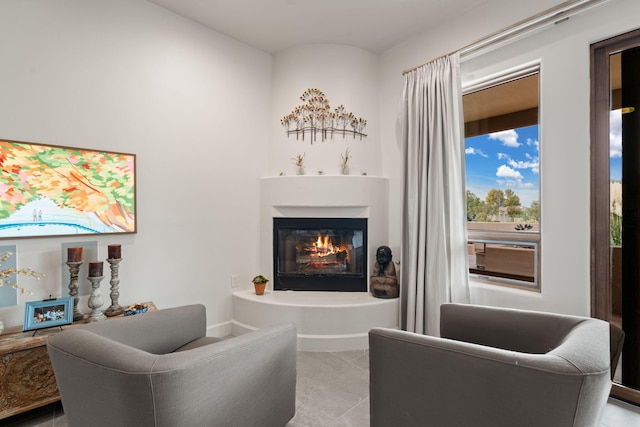 sitting room featuring light tile patterned flooring