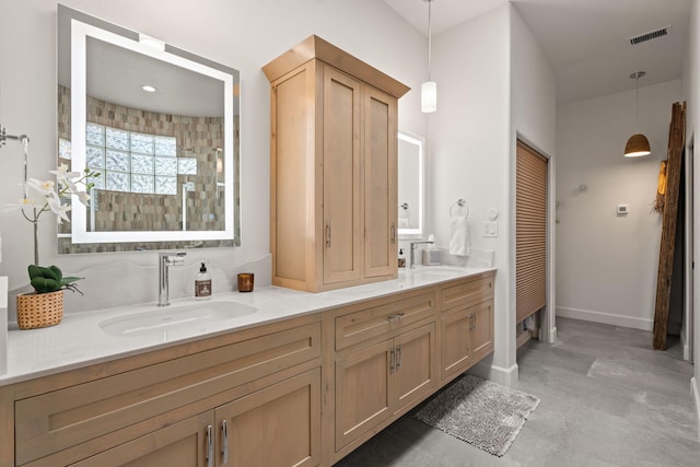 bathroom featuring vanity