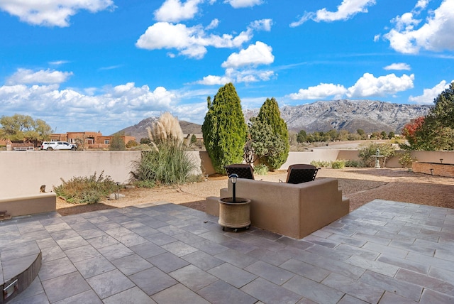 view of patio featuring a mountain view