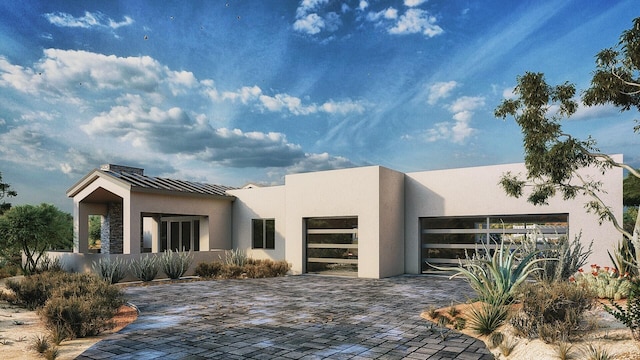 53 Evergreen Dr, Placitas, NM 87043 - modern home with stucco siding and an attached garage