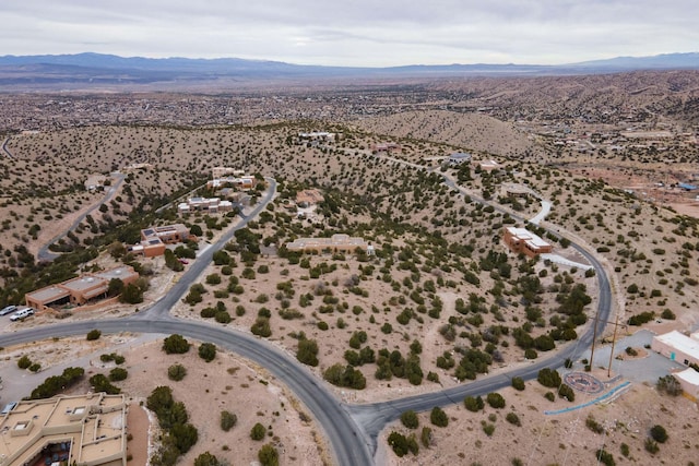 bird's eye view with a mountain view