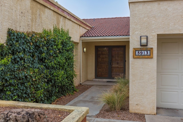 view of exterior entry with french doors