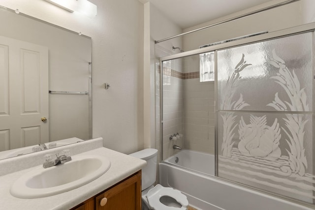 full bathroom with toilet, vanity, and enclosed tub / shower combo