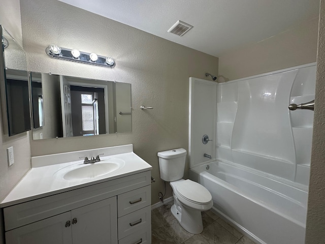 full bathroom with vanity, shower / bath combination, and toilet