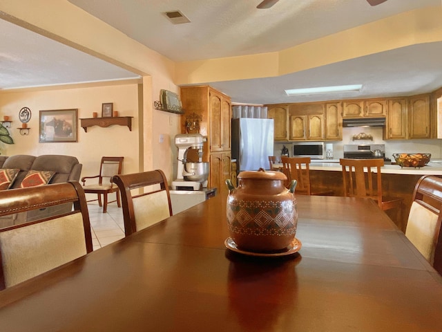 view of tiled dining room