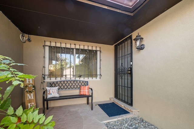 doorway to property with covered porch