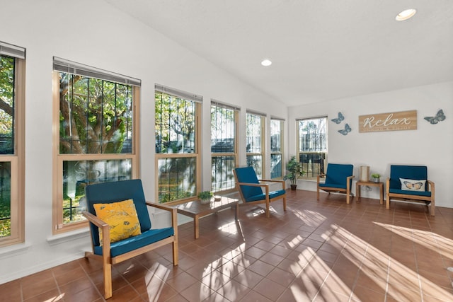 sunroom / solarium with plenty of natural light and vaulted ceiling