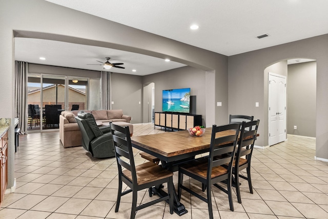 dining room with ceiling fan and light tile patterned floors