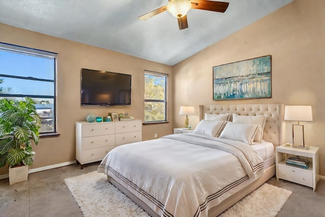 bedroom with ceiling fan, light carpet, and lofted ceiling