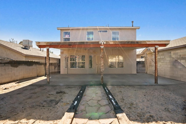 rear view of house with a patio area