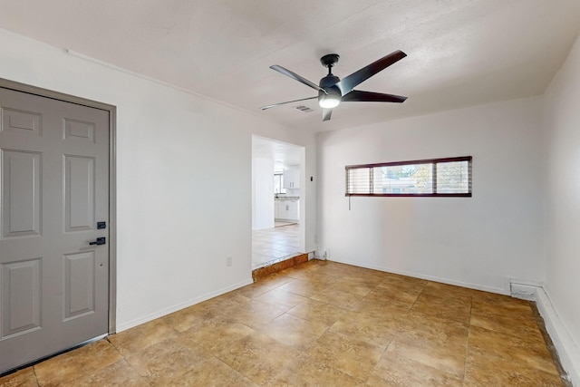 empty room with ceiling fan