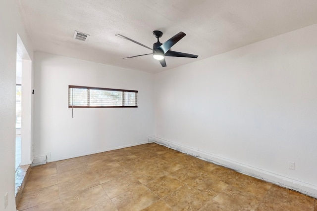 spare room featuring ceiling fan