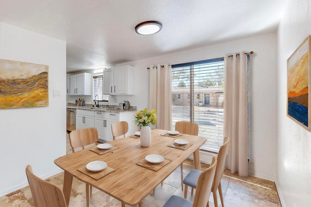 dining space featuring sink