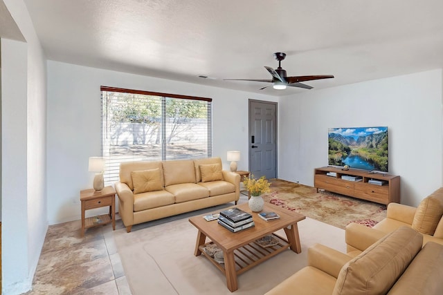 living room featuring ceiling fan