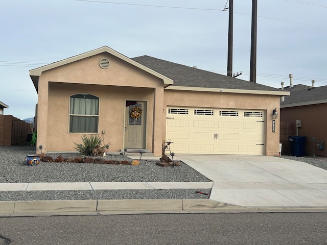 ranch-style home with a garage