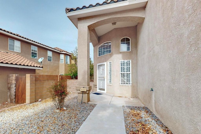 property entrance with a patio