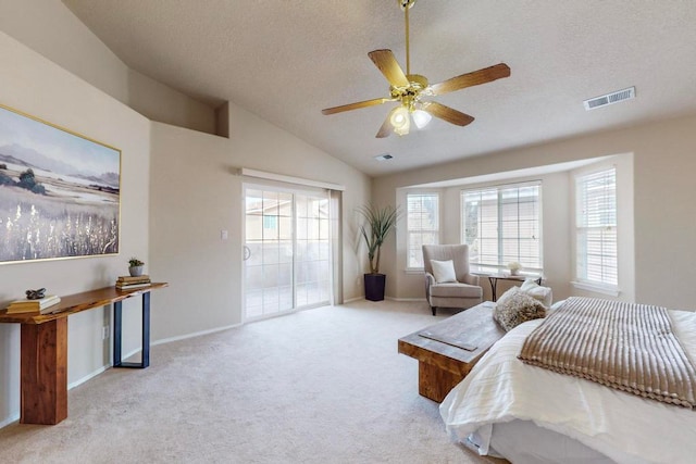 bedroom with light carpet, a textured ceiling, access to outside, ceiling fan, and lofted ceiling