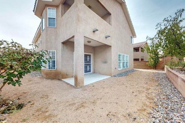 rear view of house with a patio