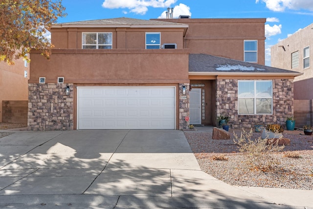 view of front of property featuring a garage