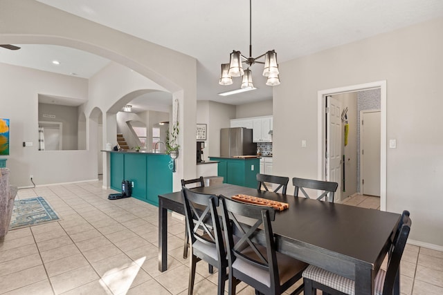 dining space featuring light tile patterned floors