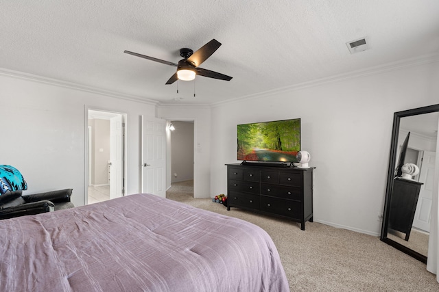 bedroom with crown molding, light colored carpet, ceiling fan, and a textured ceiling