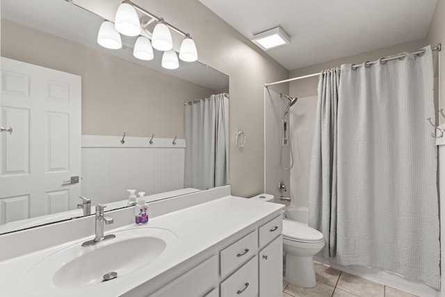 full bathroom with shower / bath combination with curtain, vanity, toilet, and tile patterned flooring