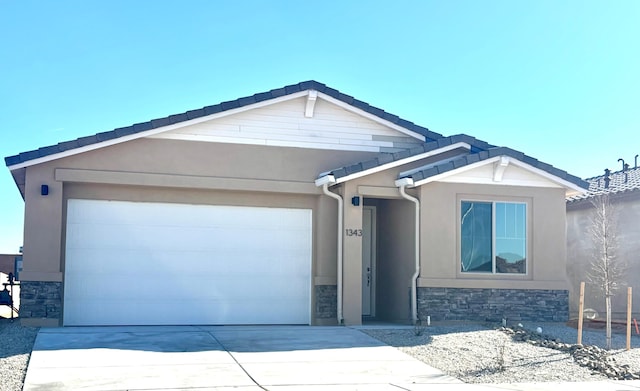 view of front of home with a garage