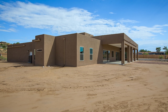 rear view of property with a patio area