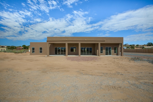 rear view of property with a patio area