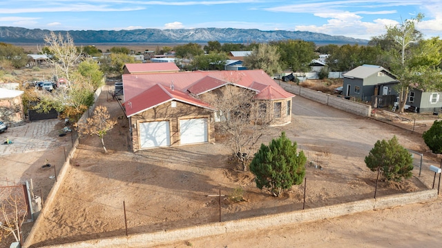 drone / aerial view featuring a mountain view