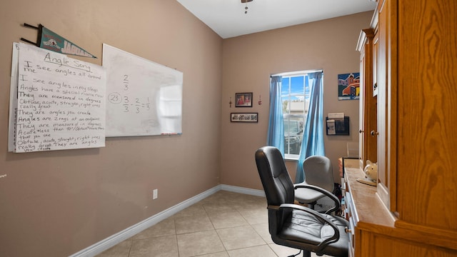 tiled office space with ceiling fan