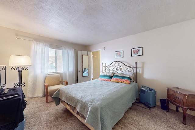 carpeted bedroom with a textured ceiling