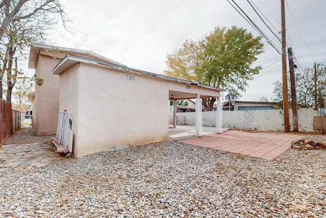 rear view of house featuring a patio area