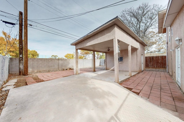 view of patio / terrace featuring ceiling fan