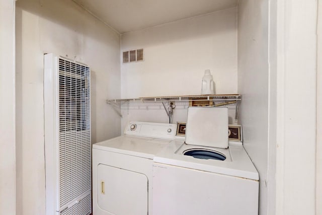 washroom with washing machine and dryer