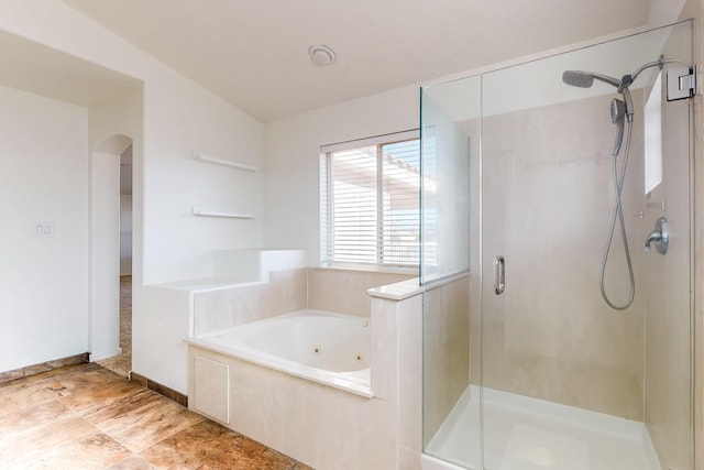 bathroom with independent shower and bath