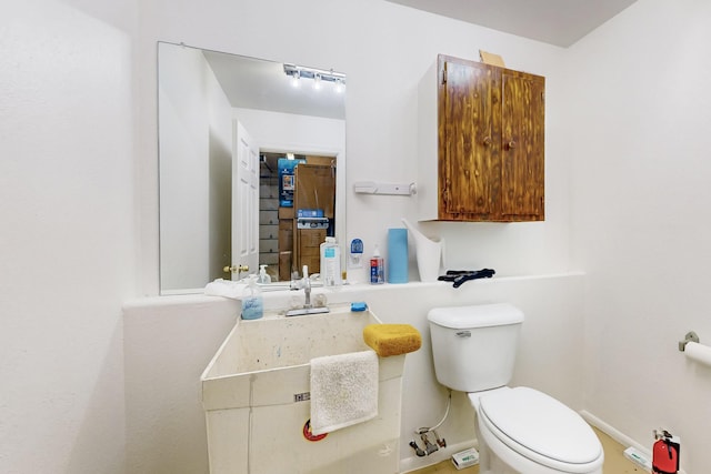 bathroom featuring toilet