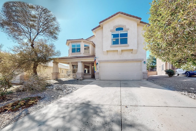 view of front of property with a garage