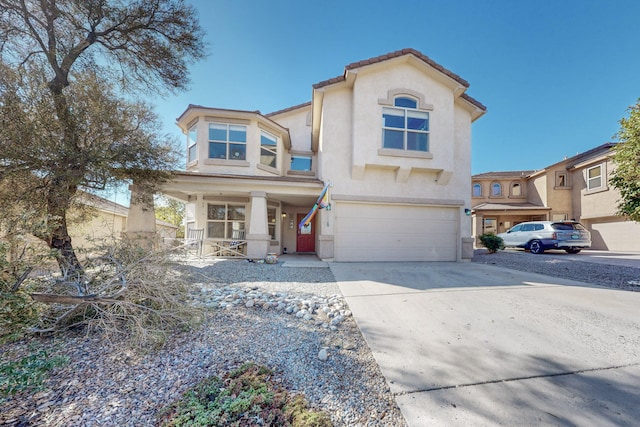 view of front of property featuring a garage and covered porch