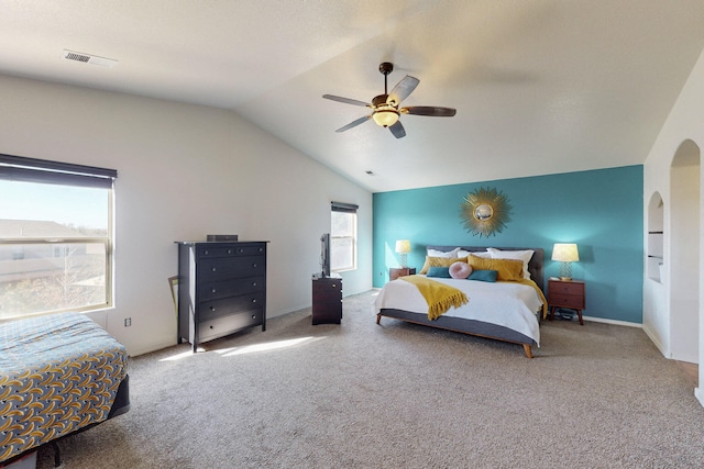 bedroom with vaulted ceiling, carpet, and ceiling fan