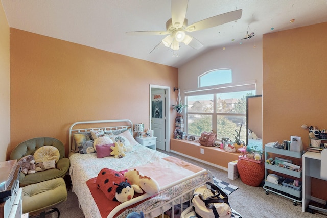 bedroom featuring vaulted ceiling, ceiling fan, and carpet