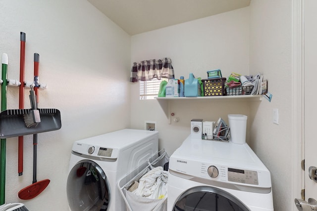 washroom with separate washer and dryer