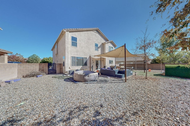 back of house with a patio area and outdoor lounge area