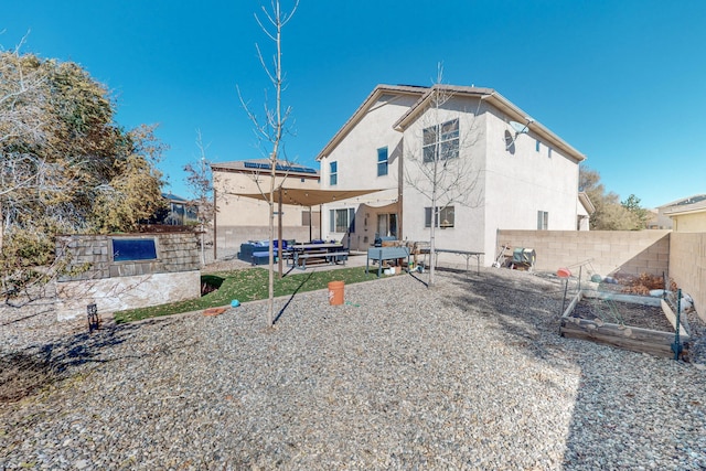 rear view of house with an outdoor living space and a patio