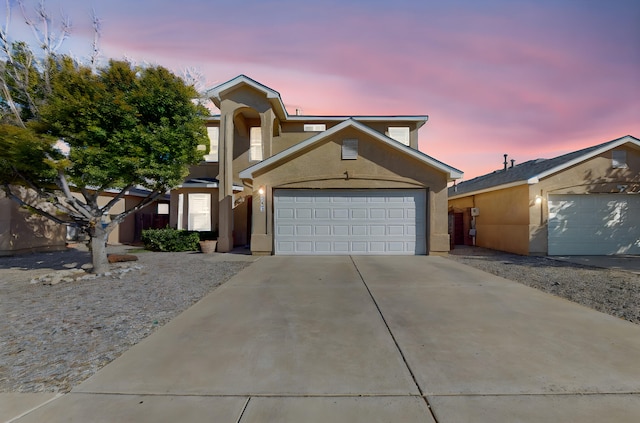 front facade with a garage