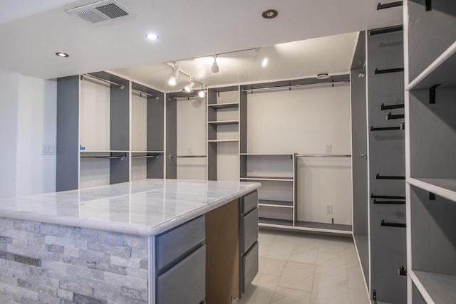 walk in closet featuring visible vents